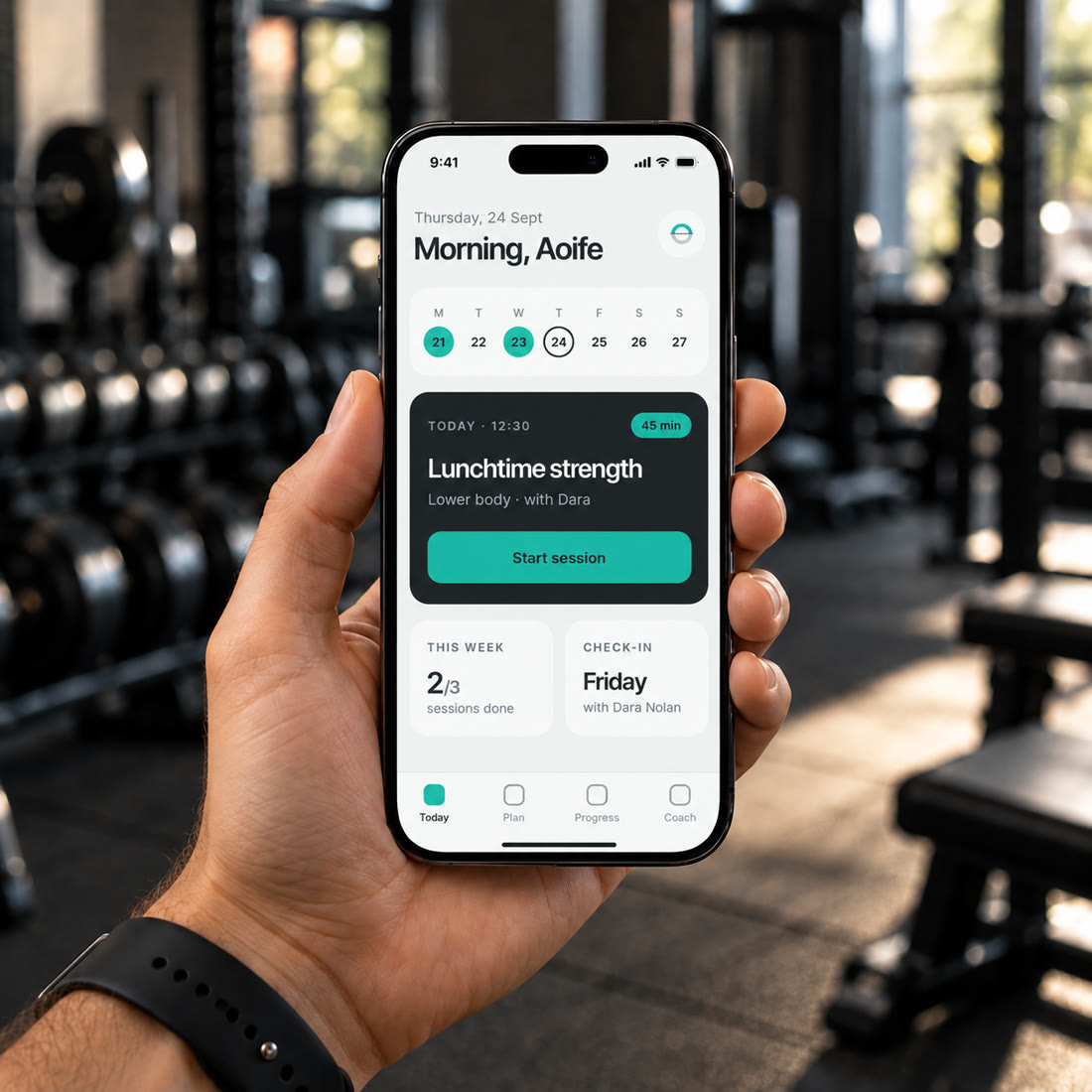 A client checking today's session in the ORTUS app at the gym